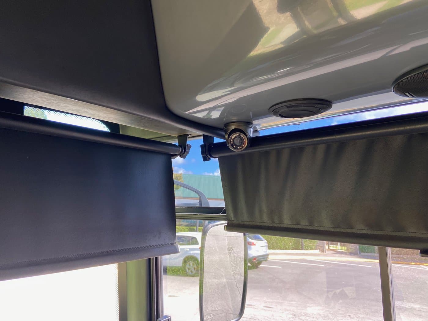 Mini camera installed inside bus near door