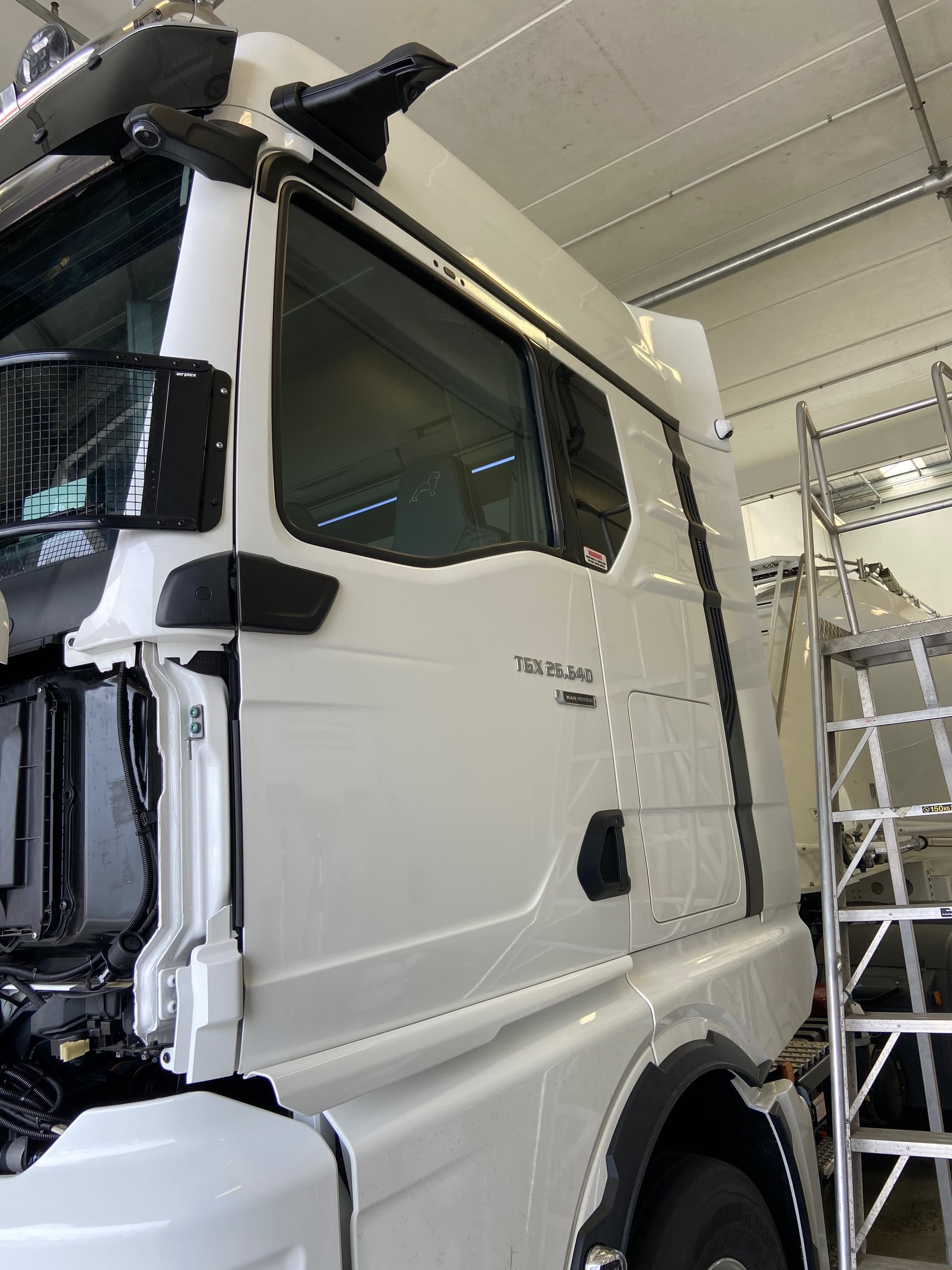 CloudCam installation — heavy truck in workshop